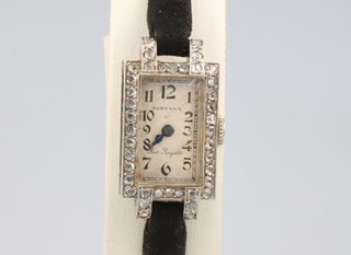 An Art Deco white gold diamond cocktail watch on a silk strap 