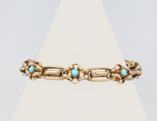 A 15ct yellow gold turquoise set bracelet 11.9 grams