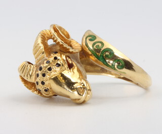 An 18ct enamelled yellow gold rams head ring size L 1/2, 10.1 grams