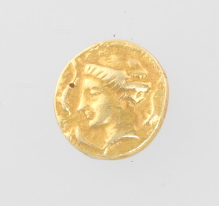 A Roman gold coin, the obverse with a portrait bust of a lady, the reverse with a figure of a winged horse 7mm, 2 grams 