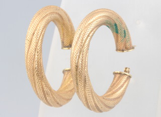 A pair of 9ct yellow gold engine turned hoop earrings 4.2 grams 