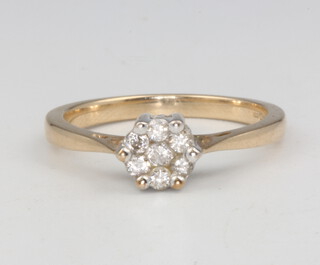 A 9ct yellow gold diamond cluster ring approx. 0.25ct, size M, 2.3 grams