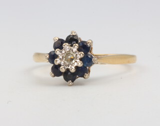 An 18ct yellow gold sapphire and diamond cluster ring size P, 3.3 grams