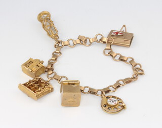 A 9ct yellow gold charm bracelet 21.2 grams 