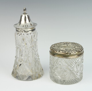 An Edwardian silver mounted sugar shaker, Sheffield 1909, ditto toilet jar 