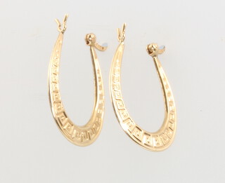 A pair of 9ct yellow gold engraved hoop earrings, 1 gram 