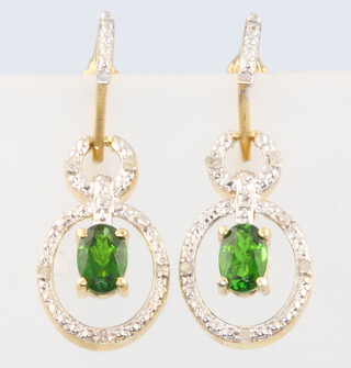 A pair of gilt and paste drop earrings