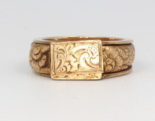 A 19th Century chased yellow gold signet ring with in memoriam envelope, 10.4 grams, size R  