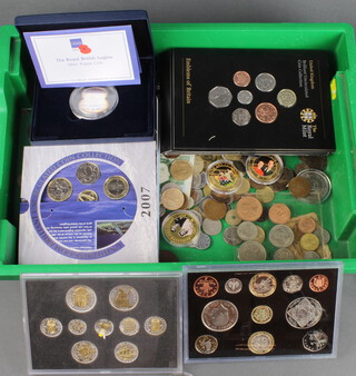 A Royal British Legion silver poppy coin 28 grams, a quantity of collectors coins and crowns 