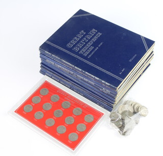 A quantity of pre decimal coinage 214 grams together with 12 folders of pre decimal coinage and 1 cased set 