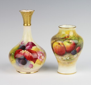 A Royal Worcester bottle vase decorated with blackberries signed K Blake 14cm no.702 together with a baluster vase decorated with fruits signed Rickett no.2491 10cm 