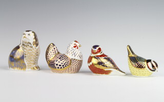 A Royal Crown Derby Imari pattern paperweight chicken 9cm, ditto bird 9cm, another 8cm and a King Charles Spaniel 9cm (all without stoppers)  