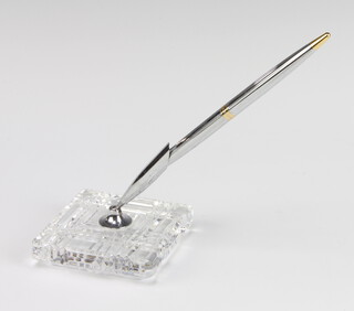 A Waterford Crystal pen stand with gilt metal roller ball pen 