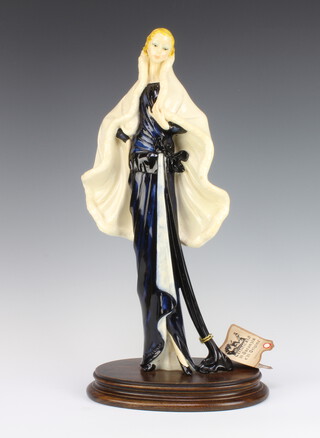 A Capodimonte figure of a lady wearing a cape signed A Santini 46cm 