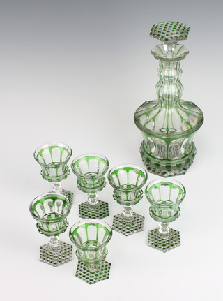 A Bohemian green and clear glass octagonal decanter, 6 sherry glasses and 1 tott 
