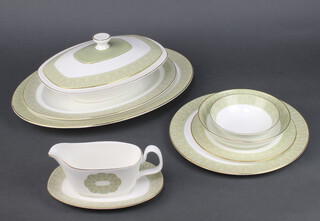 A Royal Doulton Sonnet pattern H5012 part dinner service comprising 14 dinner plates (8 are seconds), 15 medium plates (7 are seconds), 15 small (6 are seconds), 2 tureens cover (1 cover chipped), sauce boat and stand, 9 dessert bowls (1 cracked), 8 soup bowls, 2 oval meat plates 