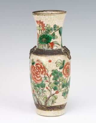 A Chinese crackle glazed vase decorated with insects and flowers 24cm 