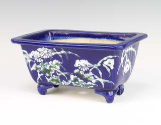 A Chinese blue ground rounded rectangular jardiniere decorated with flowers 13cm 
