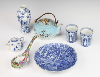 A Chinese blue and white oviform vase decorated with figures in gardens and panels of flowers 16cm, 2 blue and white beakers, a miniature teapot, transfer print dish, spoon holder and teapot