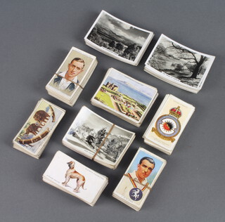 A quantity of cigarette cards including Churchmans, Senior Service and Players 