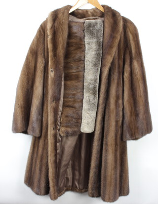 A lady's full length mink coat together with ditto stole and a simulated fur stole 