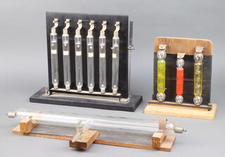 Nine various discharge tubes and a Geissler tube 