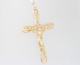 A 9ct yellow gold crucifix pendant 1.5 grams