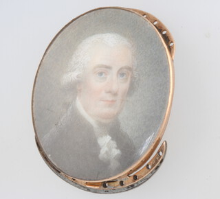 A 19th Century  painted oval miniature necklace clasp decorated with a portrait of a gentleman