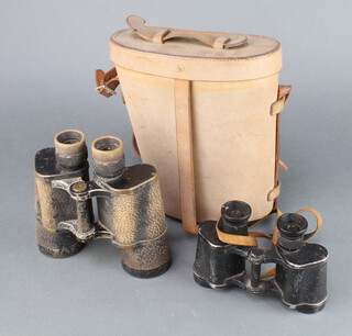 A pair of Second World War Dienstglas 6x30 binoculars 122136 Dym Plus together with a pair of Carl Zeiss 7x50 binoculars in leather case  
