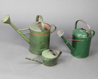 A 19th Century French green painted cylindrical watering can 28cm h x 23cm (old repair to the base), 1 other (spout f) 9cm x 15cm  