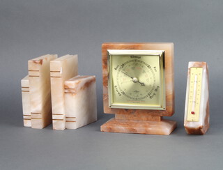 A pair of Nigel Owen carved onyx bookends in the form of books 15cm x 10cm x 7cm, a SB thermometer contained in a carved alabaster obelisk shaped case by Nigel Owen together with a ditto barometer 