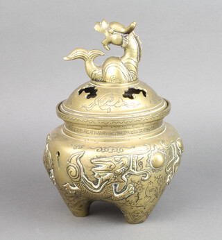 A Chinese polished bronze censer with dragon finial raised on 3 stub supports 24cm h x 17cm 