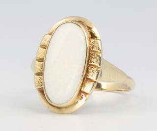A 9ct yellow gold opal dress ring 3.1 grams, size O