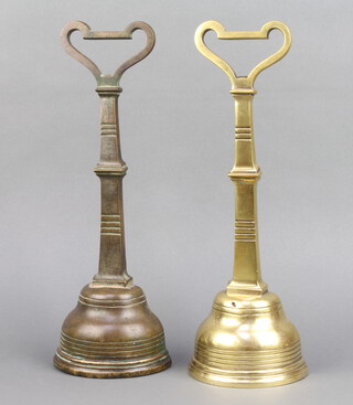 James Cartland and Sons, a pair of Victorian aesthetic movement brass door stops of club form 37cm h x 12cm w x 7cm d 