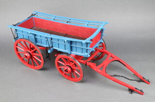 A scratch built wooden model of a Surrey wagon 22cm h x 68cm l x 23cm w