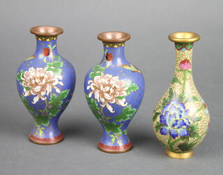 A pair of blue ground floral patterned cloisonne enamelled vases 13cm x 4cm and 1 other 12cm x 3cm 