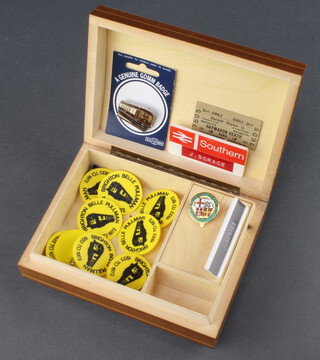 An inlaid Sorrento box containing a reproduction enamelled Southern Railways badge, 9 Brighton Bell Pullman 1937-1972 badges, a British Rail Southern badge and a reproduction Brighton Bell badge 
