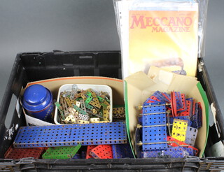 A collection of blue and red Meccano and editions of Meccano magazine etc