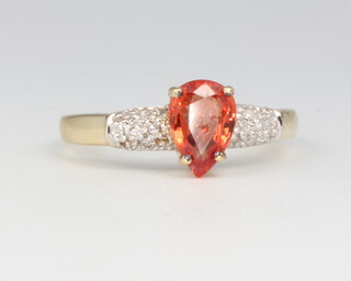 A 9ct yellow gold fire opal and diamond ring, 1.9 grams, size N 