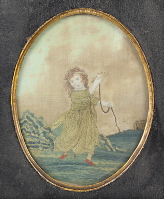 A Regency oval silver work embroidery of a young girl holding a bird 15cm x 11cm 