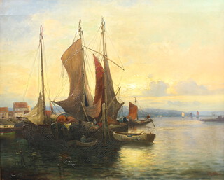 Julius Rollmann, oil on canvas signed, sunset harbour scene with fishing boats and figures and distant hills 54cm x 67cm  