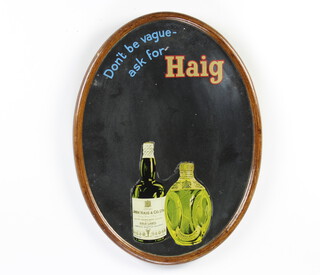 Advertising, an oval mirror "Don't Be Vague Ask for Haig", framed 39cm x 29cm 