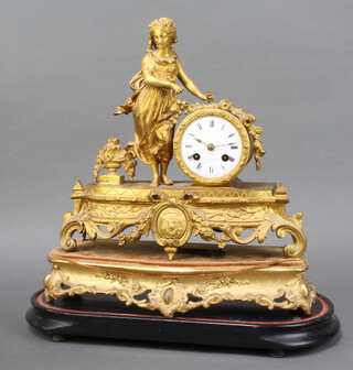 Pert Bally Brevete a'Paris, a 19th Century French 8 day striking mantel clock with enamelled dial and Roman numerals marked Alfred B Pearce 23 Ludgate Hill, the back plate marked  20047 Pert Bally Brevete a'Paris, contained in a gilt metal case surmounted by a figure of a standing girl complete with pendulum and key and pierced hardwood stand  