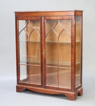 A Georgian style mahogany display cabinet enclosed by astragal glazed panelled doors 122cm h x 96cm w x 32cm d 