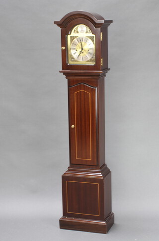 A striking Granddaughter clock with gilt dial and silvered chapter ring contained in a mahogany case 148cm x 34cm x 20cm 