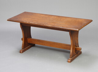 A rectangular oak refectory style coffee table on standard end supports with H framed stretcher 42cm h x 91cm l x 37cm d 