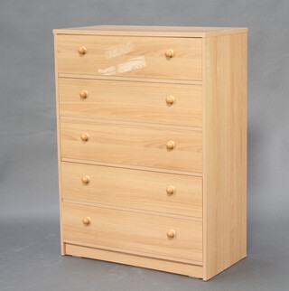 A wooden laminate finished chest of 5 long drawers with turned handles 104cm h x 76cm w x 39cm d 