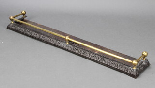 A pierced and brass railed fire curb 11cm h x 113cm w x 21cm d 