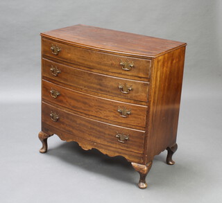 A Georgian style mahogany bow front chest of 4 long drawers with brass swan neck drop handles, raised on cabriole supports 82cm h x 81cm w x 46cm d 