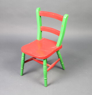 A child's 19th Century red and green painted elm Windsor bar back chair 
